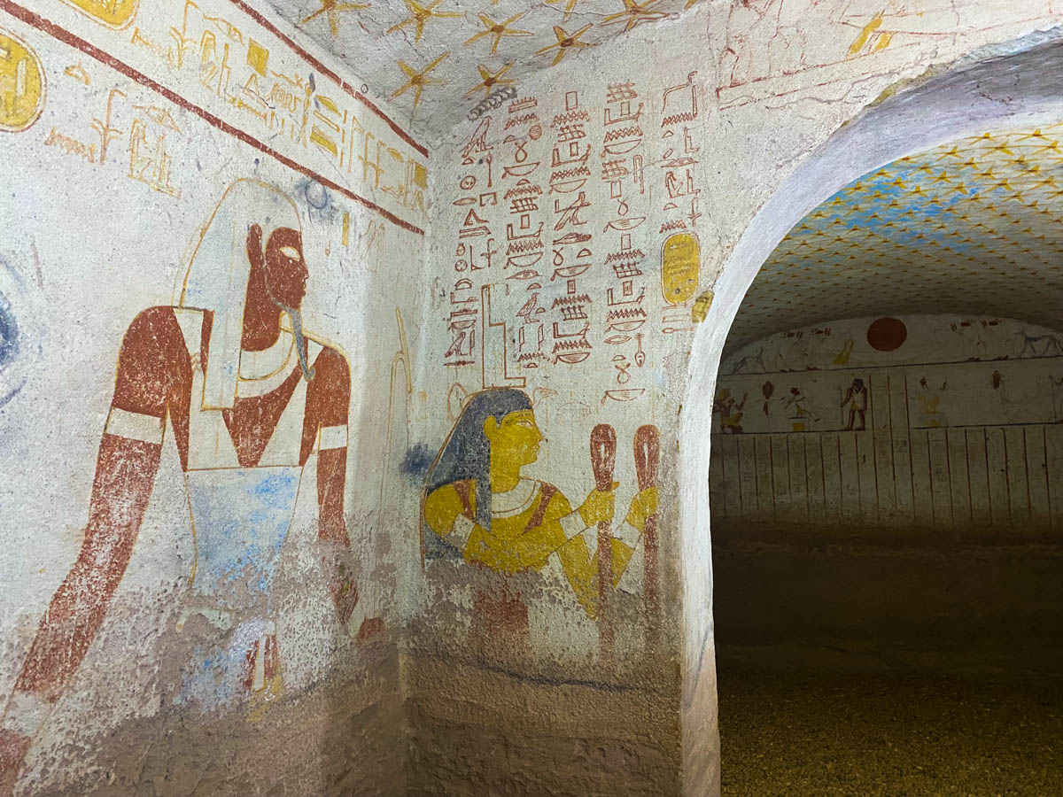 An elaborately decorated tomb and archway.