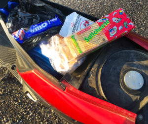 Packets of unhealthy snacks lying inside my bike.
