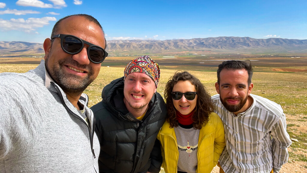 The four of us posing in front of the plains in the Hermel area.