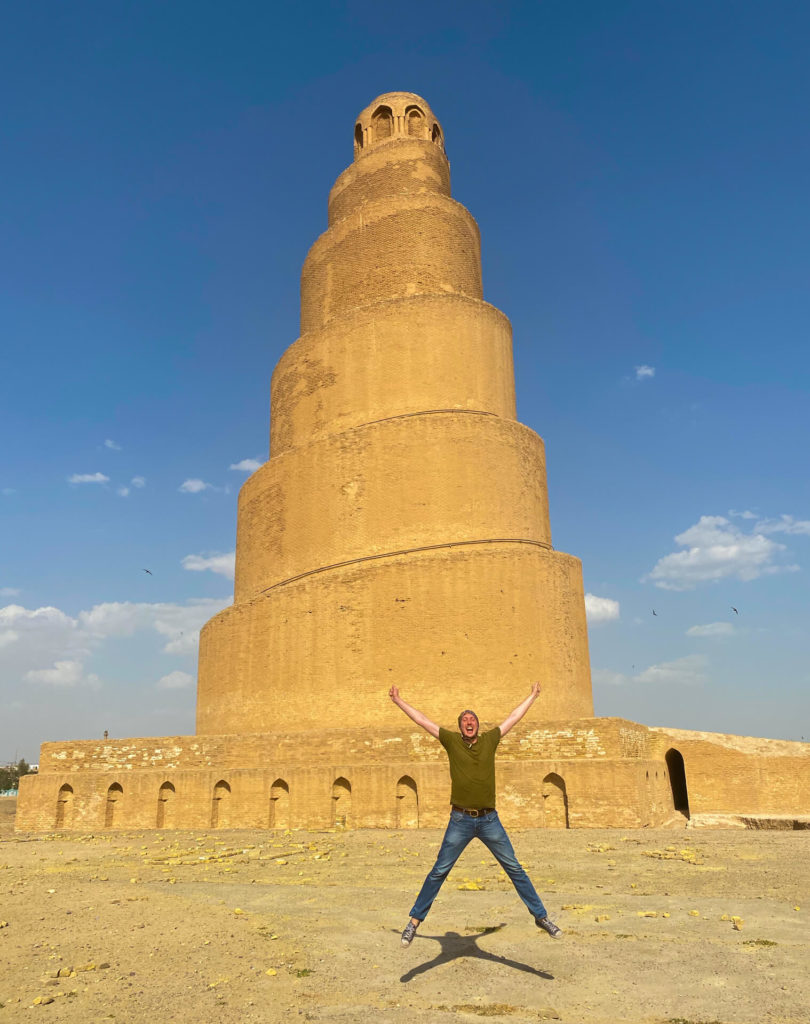 Me doing a star jump in front of the Malwiya Minaret.