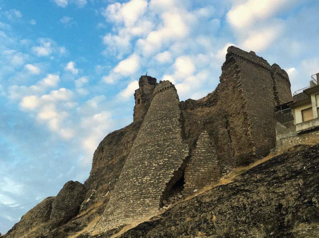 A turret of the Bashtabya Castle sliding down the banks of the Tigris river.