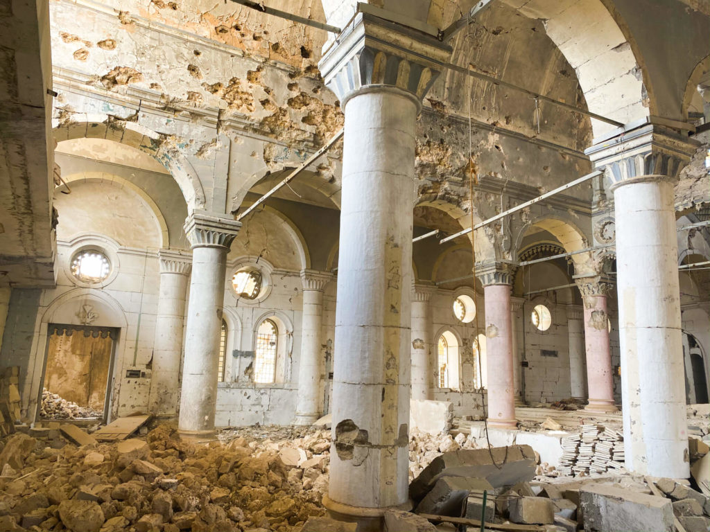 The remains of the Al Tahira church with bullet holes in the walls.