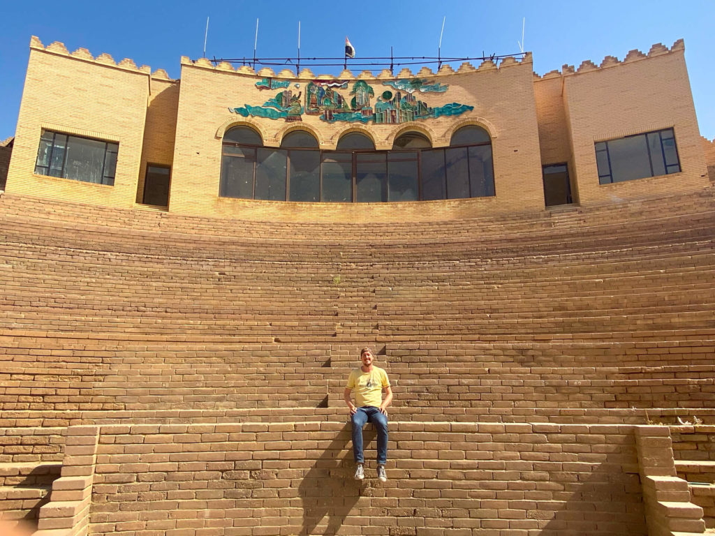 Me, sitting in the ancient Babylonian amphitheatre in the ruins of Babylon.