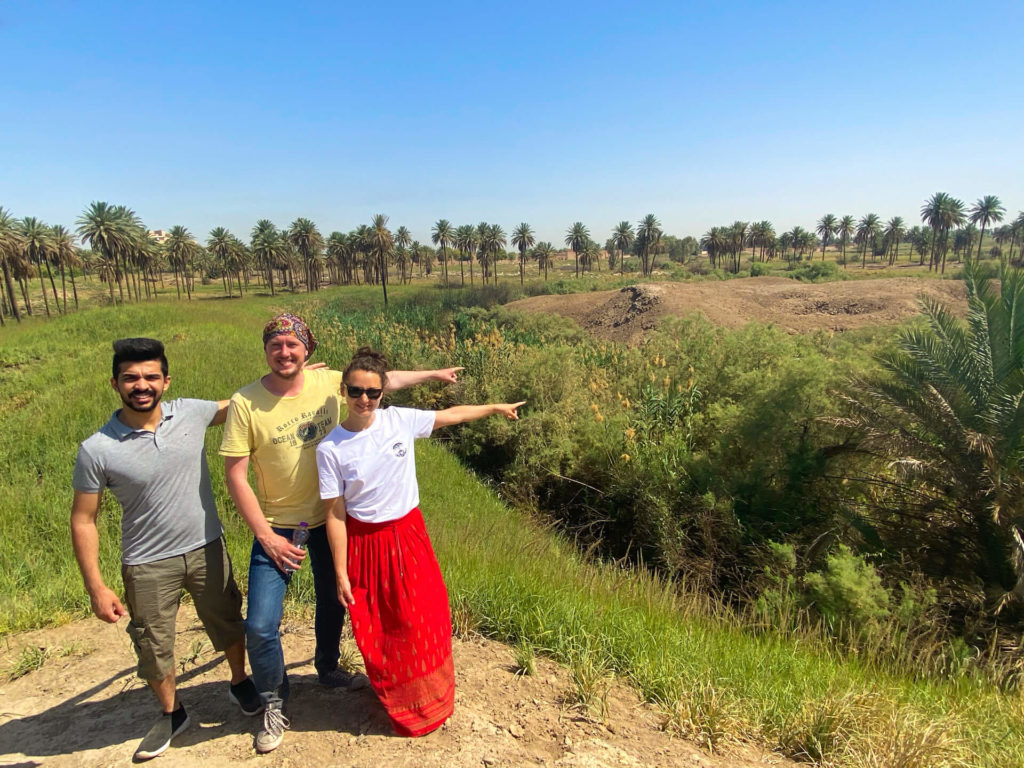 Me, Anna and Haydir pointing at the site where the Tower of Babel once stood - a flattened area of earth surrounded by a moat.