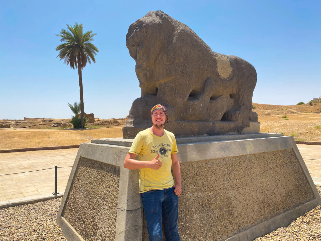Me, standing in front of the statue of the Lion of Babylon.