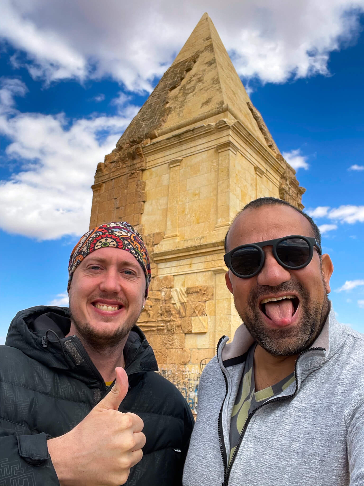 Me and a friend in front of the Pyramid of Hermel
