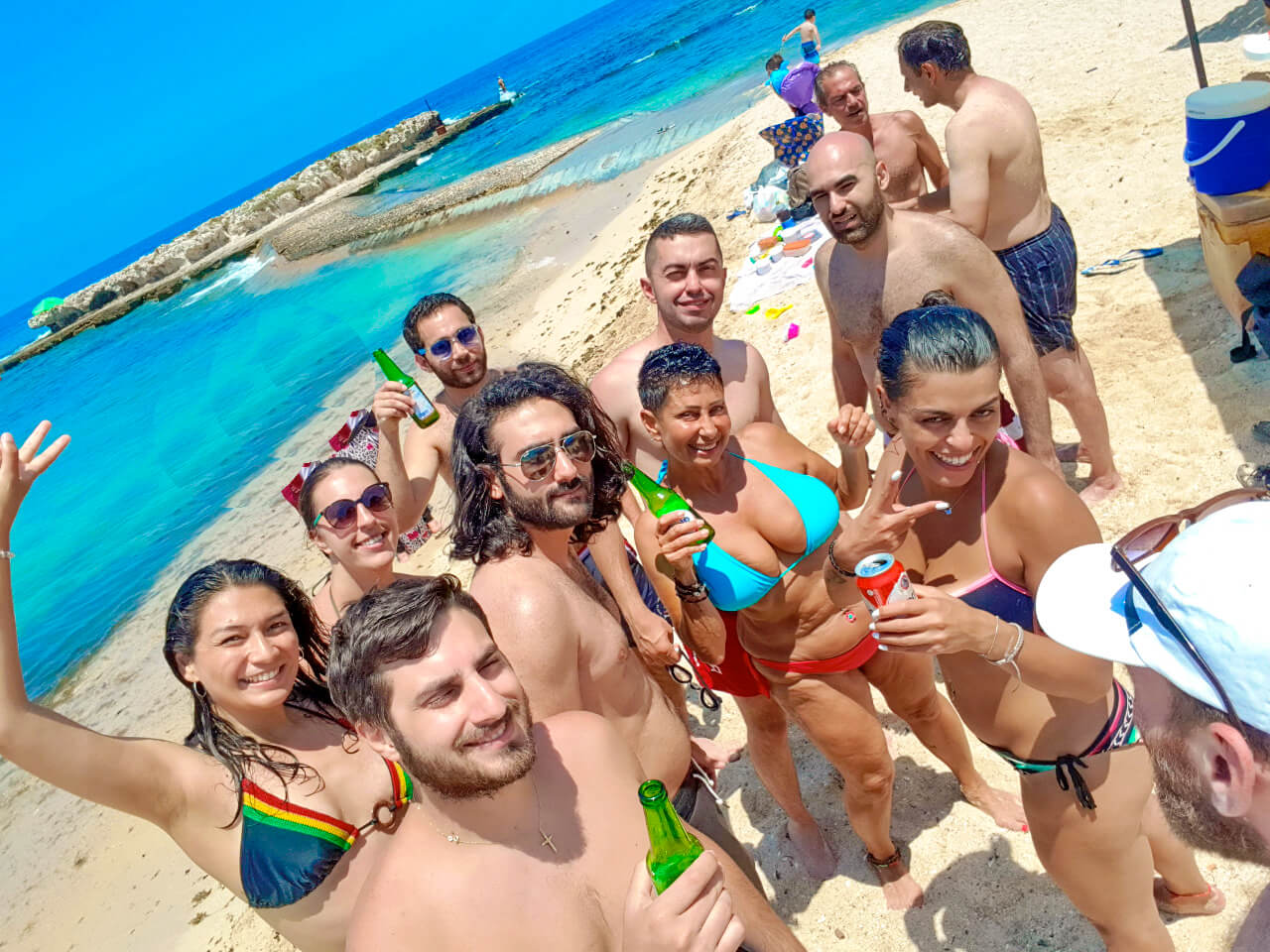 Me and a group of friends in swimwear on the beach on Rabbit Island.