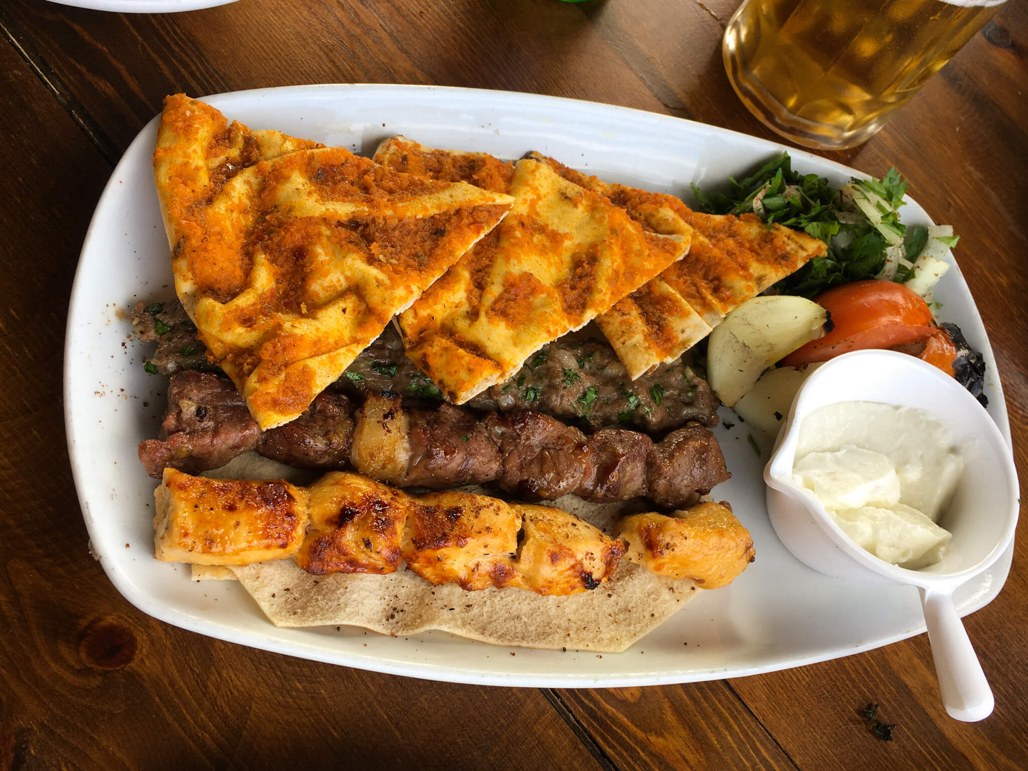 A plate of shish kebab, with lamb, chicken and kafta.
