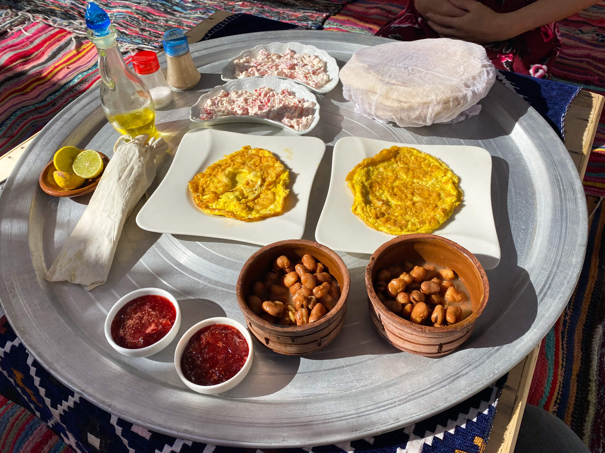 Traditional Egyptian breakfast with many different dishes.