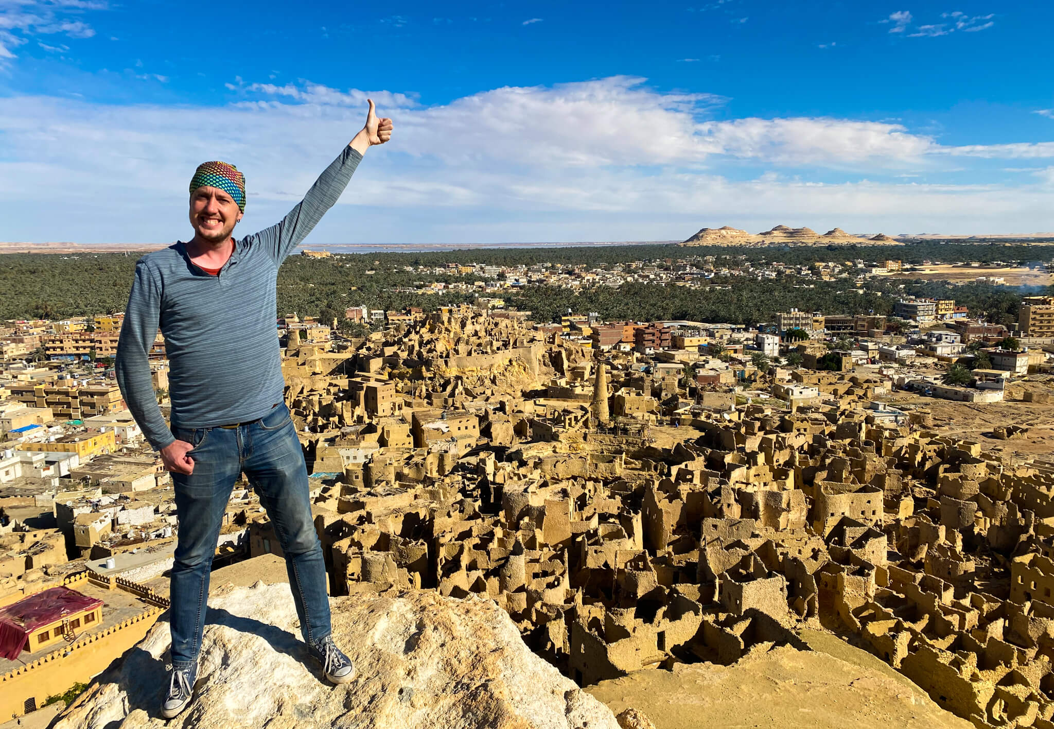 Me standing on the top of the hill behind the Shali Fortress with a beautiful view of the old town and Dakrur Mountain.