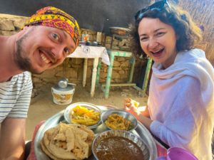 Anna and I with bread, omelette, fries and foul