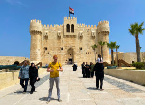 Me, standing in front of Qaitbay citadel in the sunshine