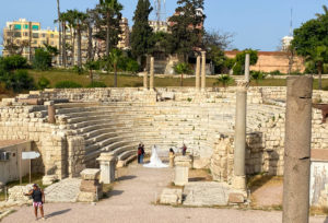 An Alexandrian couple take wedding photos inside the Roman theatre.