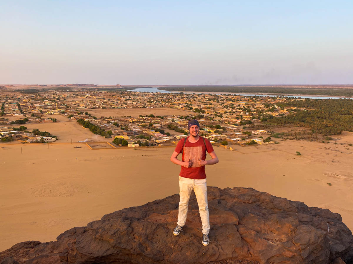 Me, standing on an outcrop of Jabel Barkal, with Karima and the Nile behind me.