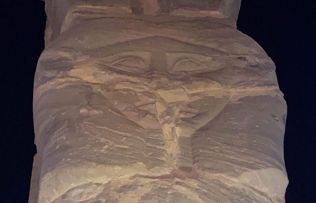 A face carved into the stone of one of the pillars of the Temple of Mut.